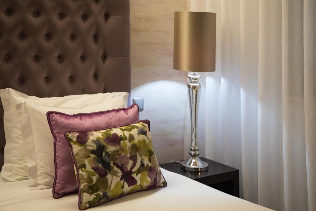 Postel nebo postele na pokoji v ubytování Belem Hotel