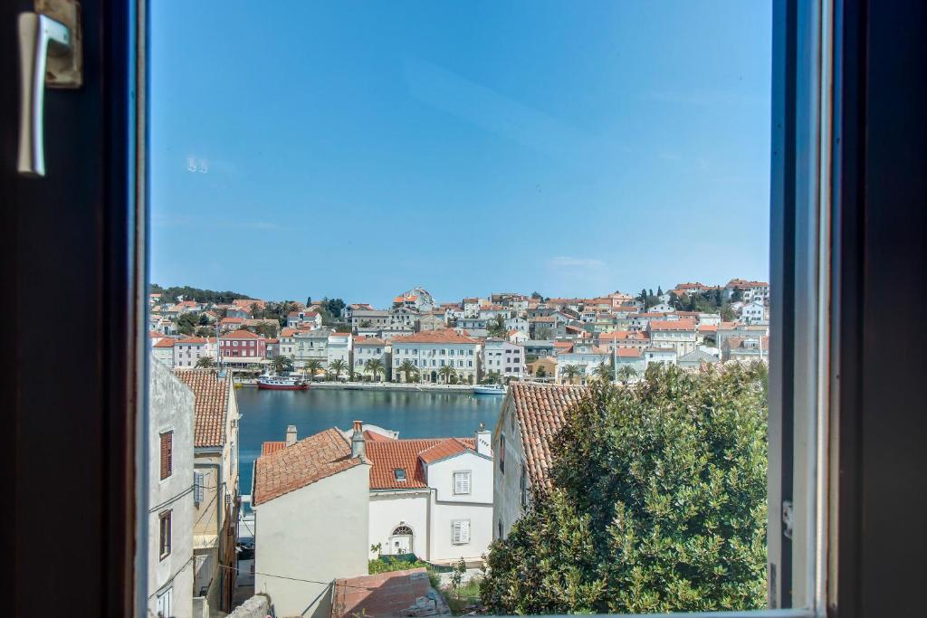 a view of a city from a window at Apartment Danilo in Mali Lošinj