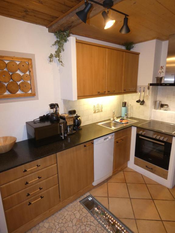 Kuchyň nebo kuchyňský kout v ubytování Apartments Donebauer