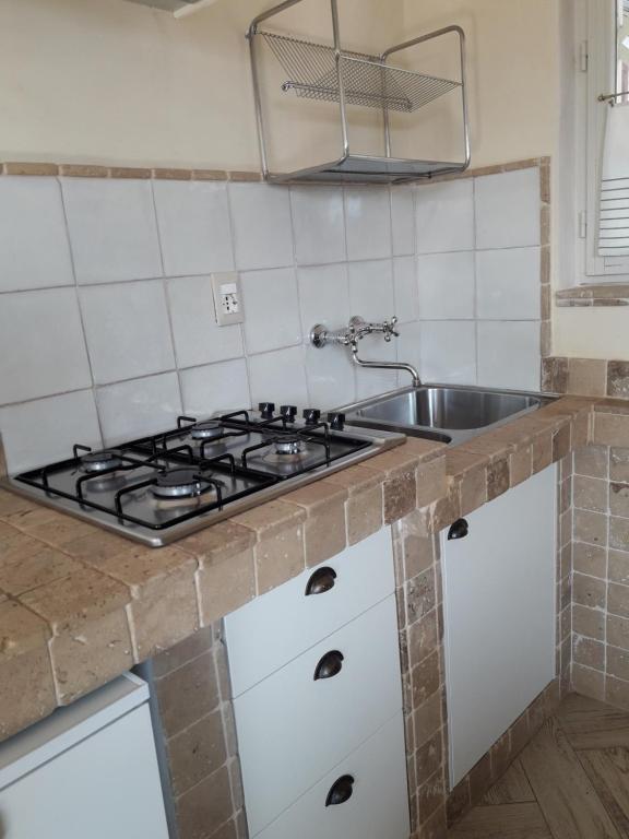 A kitchen or kitchenette at Cà del borgo Historic Village