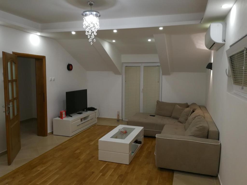 Svetainės erdvė apgyvendinimo įstaigoje Apartment Misulino
