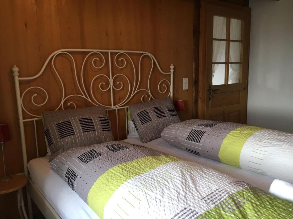 Postel nebo postele na pokoji v ubytování Appartement Fernsicht Triesenberg