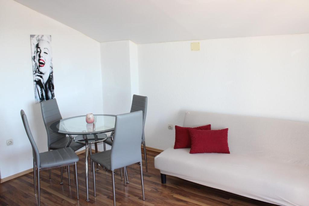 Posedenie v ubytovaní Apartments Villa Arta