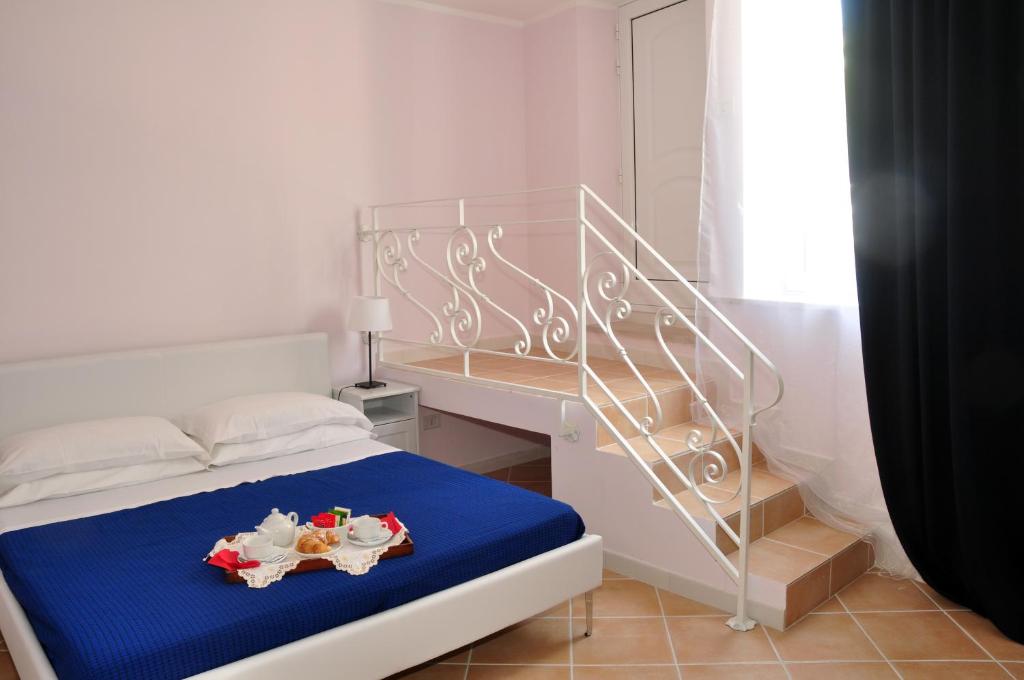 Postel nebo postele na pokoji v ubytování B&B Marebello