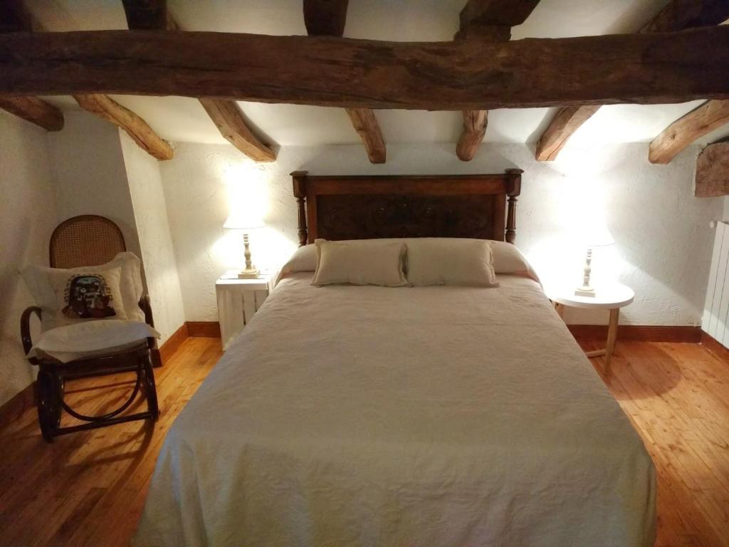 Postel nebo postele na pokoji v ubytování Bentzuntzibar
