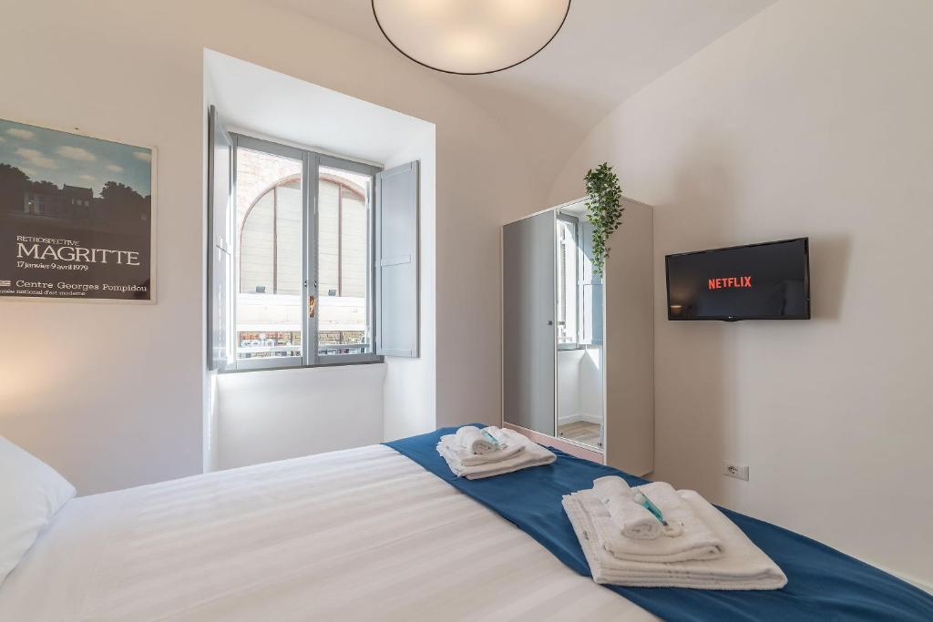 Posteľ alebo postele v izbe v ubytovaní Roma Station House