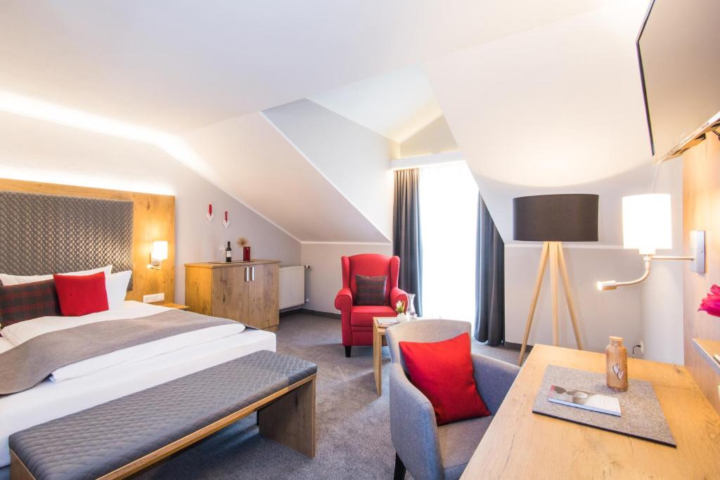 Postel nebo postele na pokoji v ubytování Genusshotel "Zum Wendl"