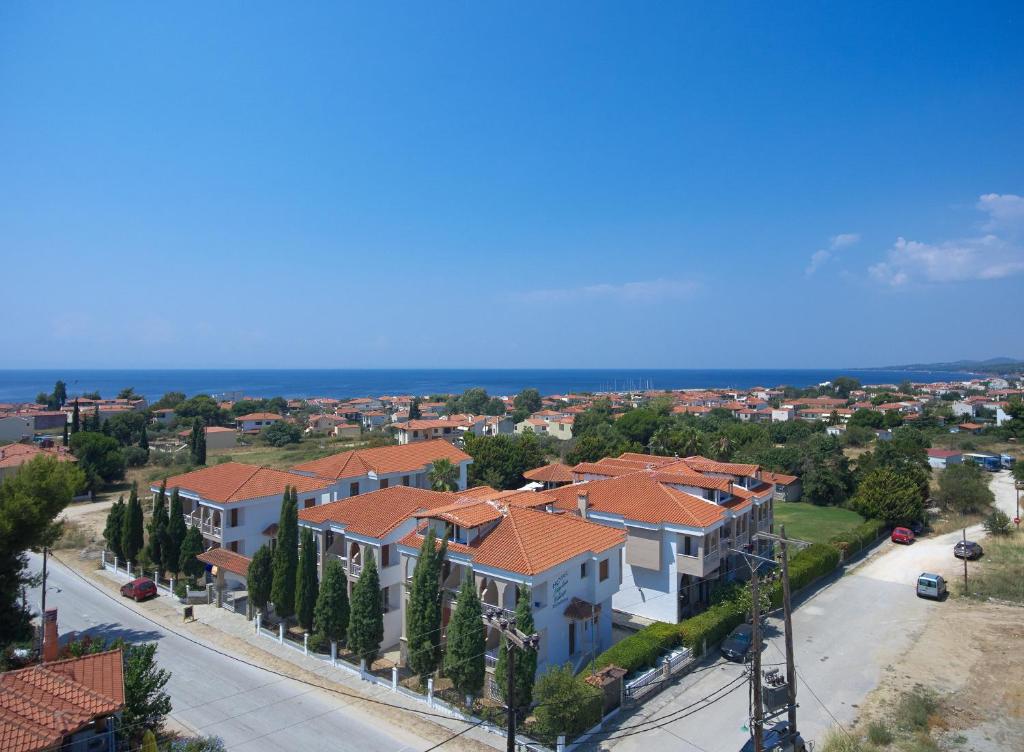 arial view of a city with houses at Acrotel Lily Ann Village in Nikiti