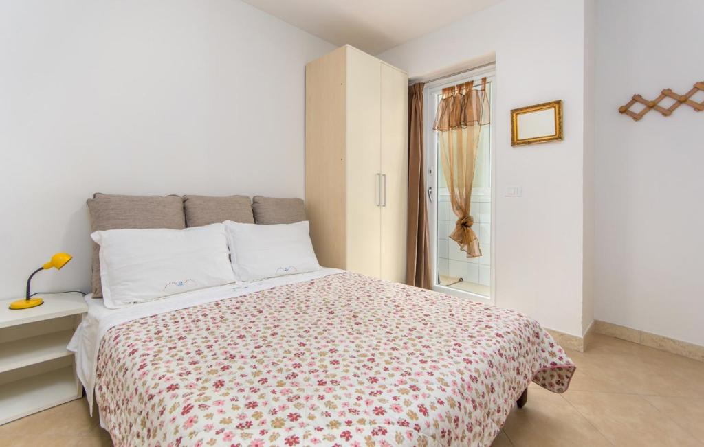 Łóżko lub łóżka w pokoju w obiekcie Apartment Riva Porec