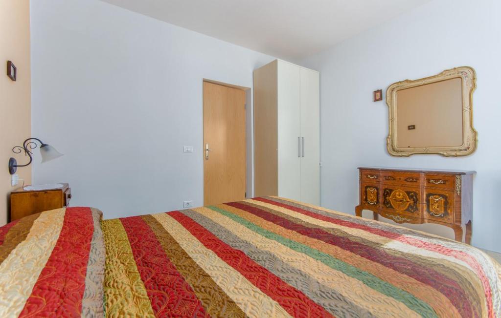 Łóżko lub łóżka w pokoju w obiekcie Apartment Riva Porec