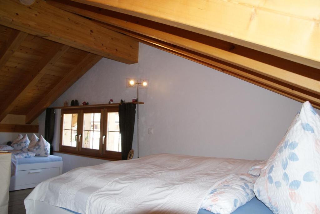 Postel nebo postele na pokoji v ubytování Chalet Lenzerheide-Sporz