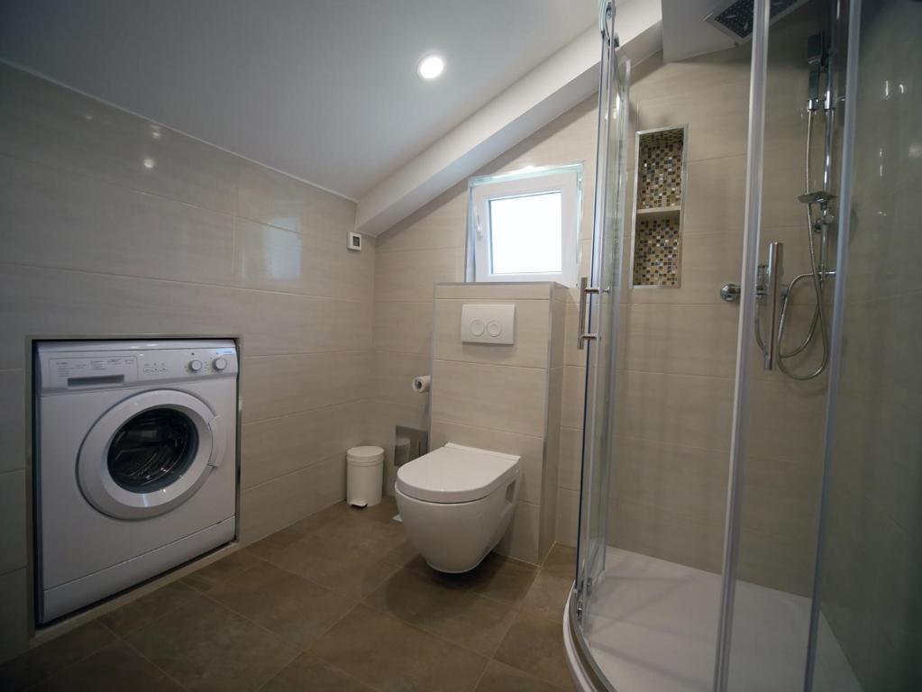 Kúpeľňa v ubytovaní Apartment Srđ