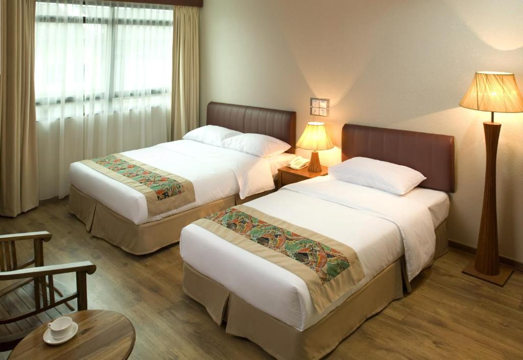 Postel nebo postele na pokoji v ubytování Muarar 99 Hotel