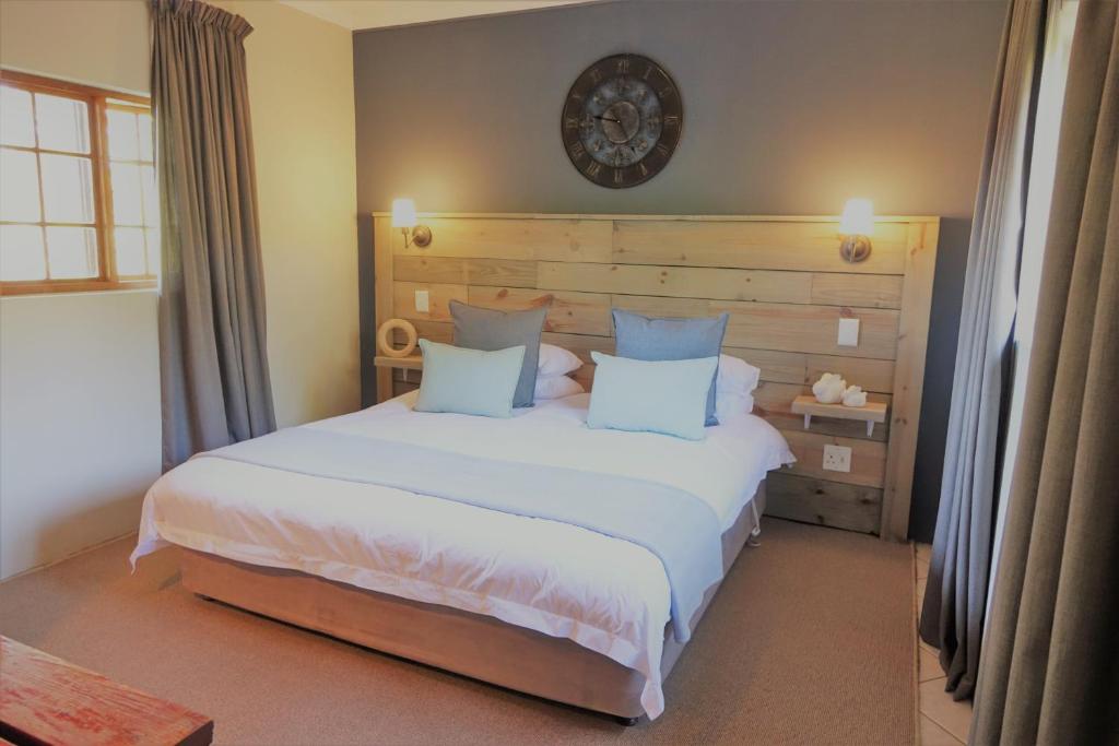 Postel nebo postele na pokoji v ubytování Notting Hill Lodge