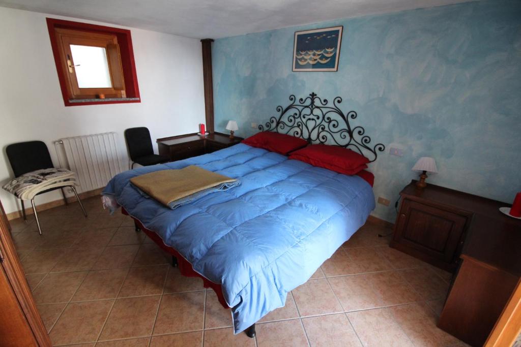 Postel nebo postele na pokoji v ubytování Il Castello
