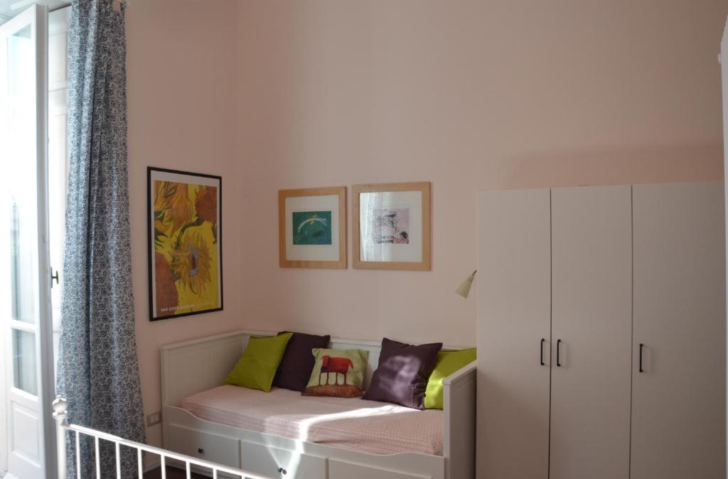 Łóżko lub łóżka w pokoju w obiekcie Casa Arcoiris