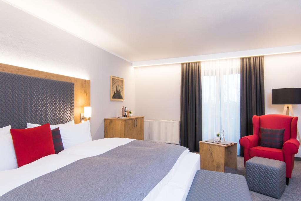Postel nebo postele na pokoji v ubytování Genusshotel "Zum Wendl"
