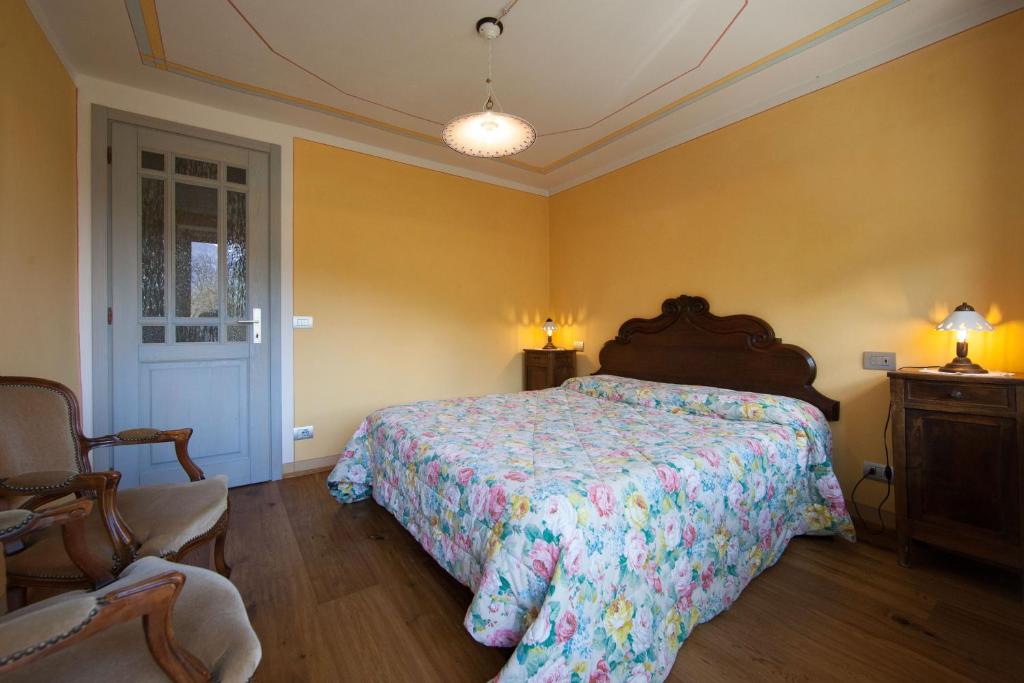 Postel nebo postele na pokoji v ubytování B&B I Corni di Nibbio