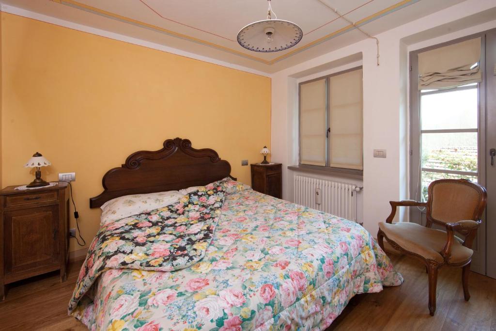Postel nebo postele na pokoji v ubytování B&B I Corni di Nibbio