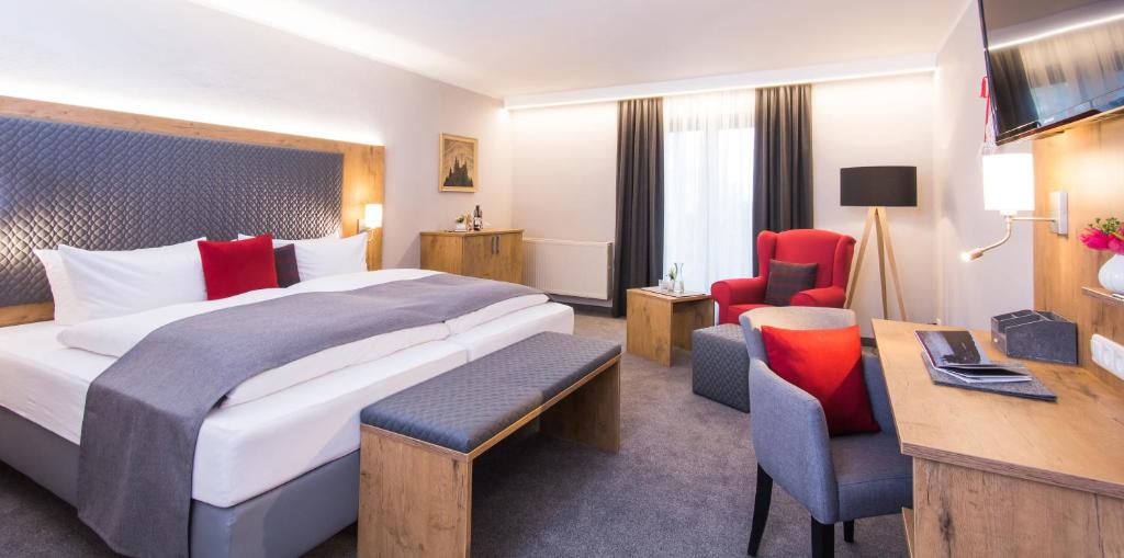 Postel nebo postele na pokoji v ubytování Genusshotel "Zum Wendl"