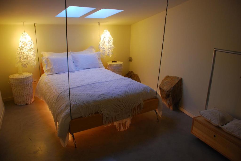 Postel nebo postele na pokoji v ubytování Casa da Cisterna