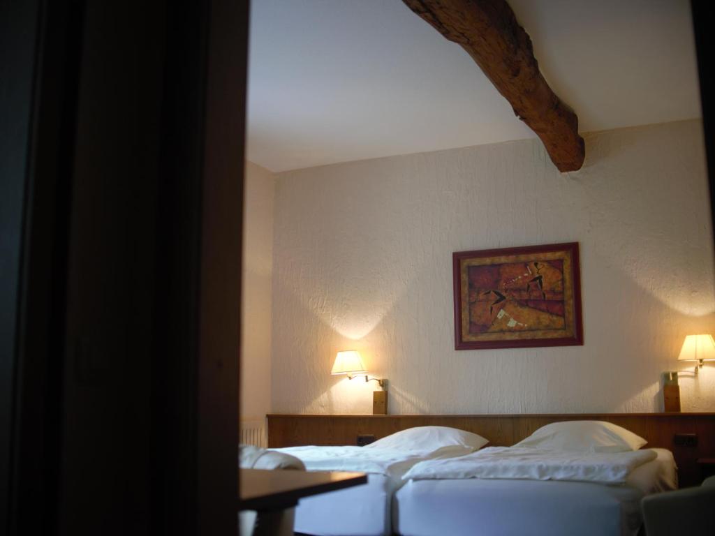 Postel nebo postele na pokoji v ubytování Hotel Restaurant Jägerhof