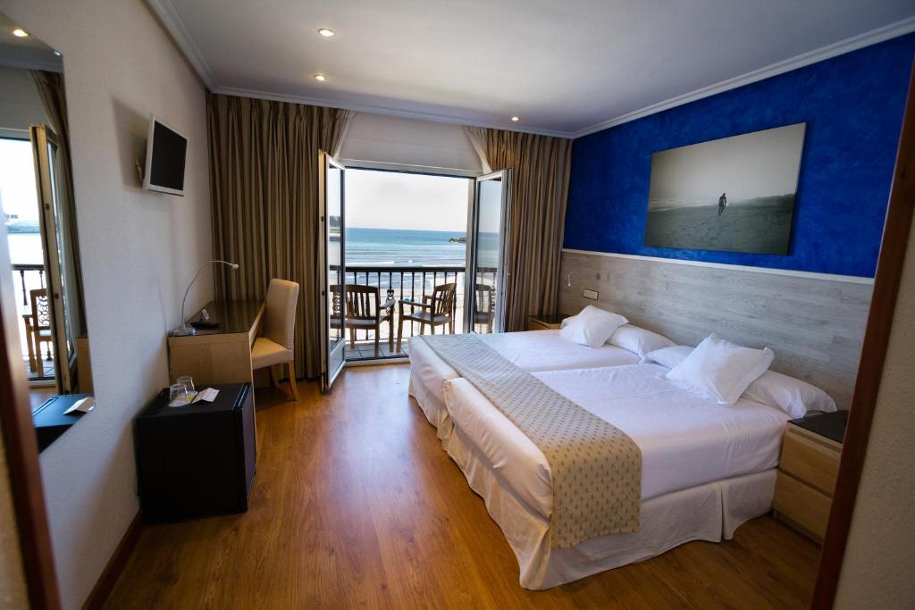 Postel nebo postele na pokoji v ubytování Hotel Don Pepe