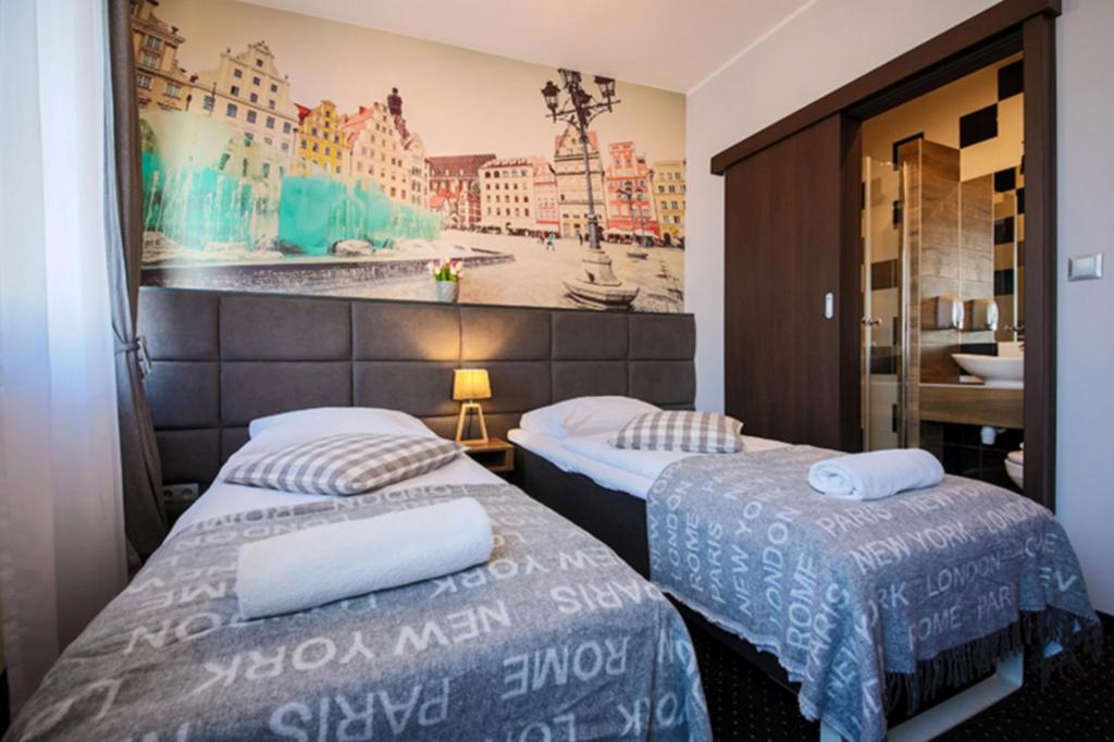 Posteľ alebo postele v izbe v ubytovaní Boogie ApartHouse Old Town
