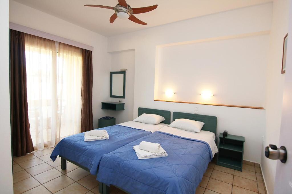 Postel nebo postele na pokoji v ubytování Evropi Hotel