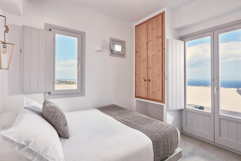 Letto o letti in una camera di Elysian Santorini