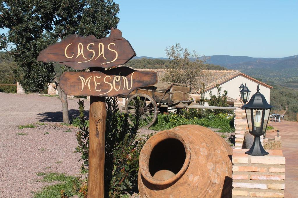 a sign for a yos resort in front of a house at Finca El Chaparral in Cortelazor