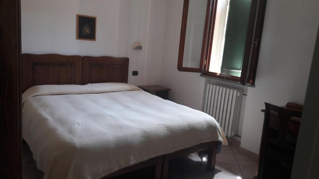 Łóżko lub łóżka w pokoju w obiekcie Acquacheta Valtancoli Hotel B&B