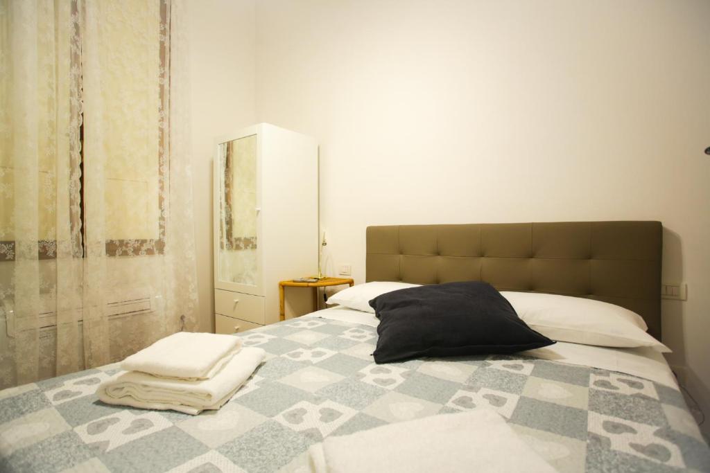 Posteľ alebo postele v izbe v ubytovaní Via Guelfa Apartment