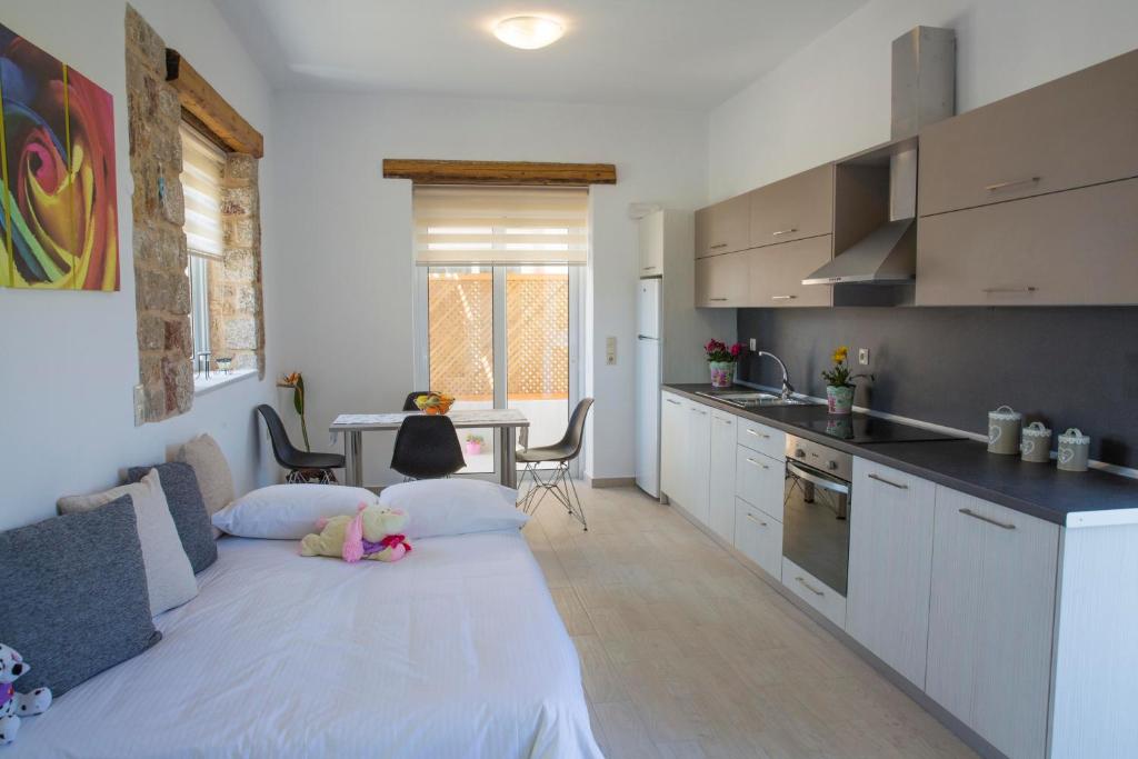 Kuchyň nebo kuchyňský kout v ubytování G&K Stone Suites