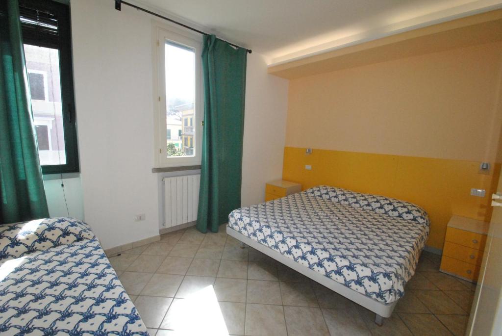 A bed or beds in a room at Villa Fiorella