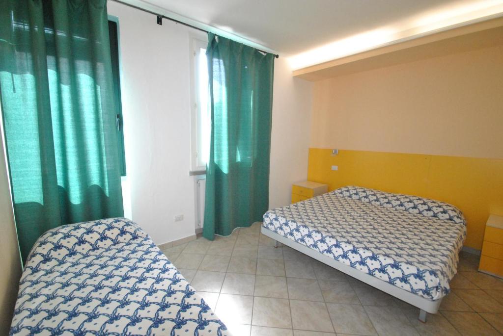 A bed or beds in a room at Villa Fiorella