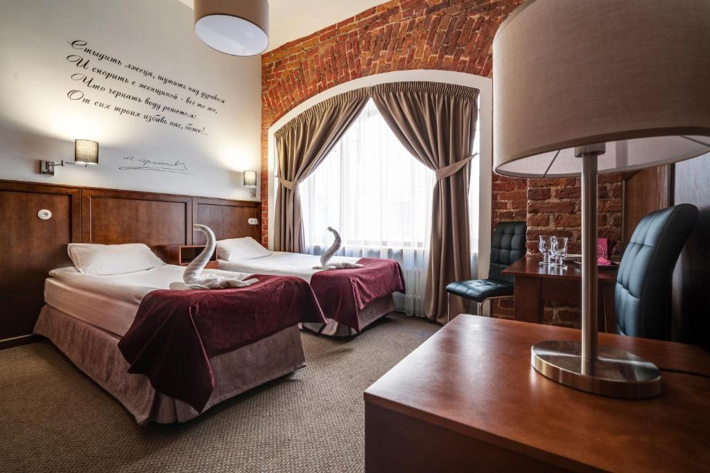 En eller flere senger på et rom på Hotel Nevsky 74