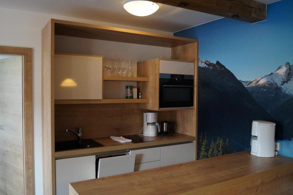 Kuchyňa alebo kuchynka v ubytovaní Aparthotel Garni Schranz