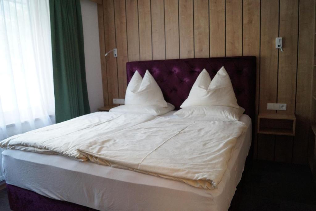 Posteľ alebo postele v izbe v ubytovaní Aparthotel Garni Schranz