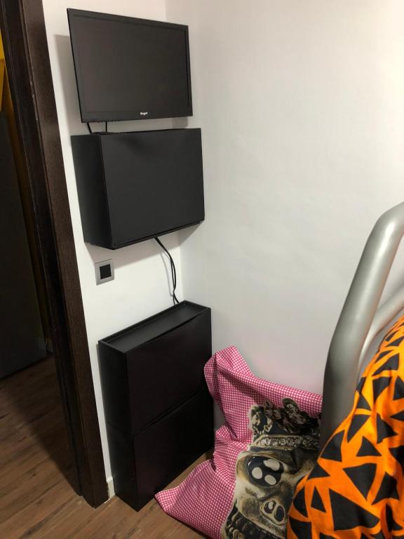Telewizja i/lub zestaw kina domowego w obiekcie Apartamento Doña Pia