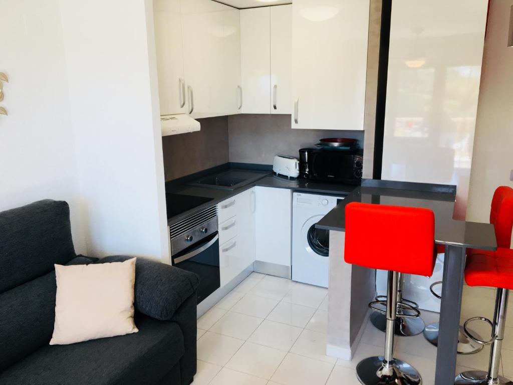 Kuchyň nebo kuchyňský kout v ubytování Apartamentos Las Haciendas Altamar