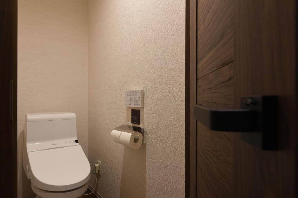 Koupelna v ubytování Enoca Hotel