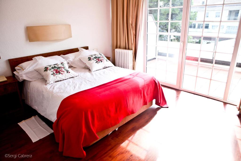 Postel nebo postele na pokoji v ubytování Hotel Pintor Marsà