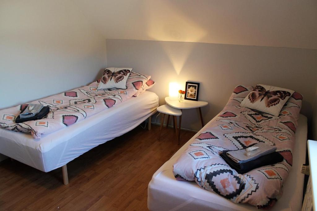 Postel nebo postele na pokoji v ubytování Guesthouse 43