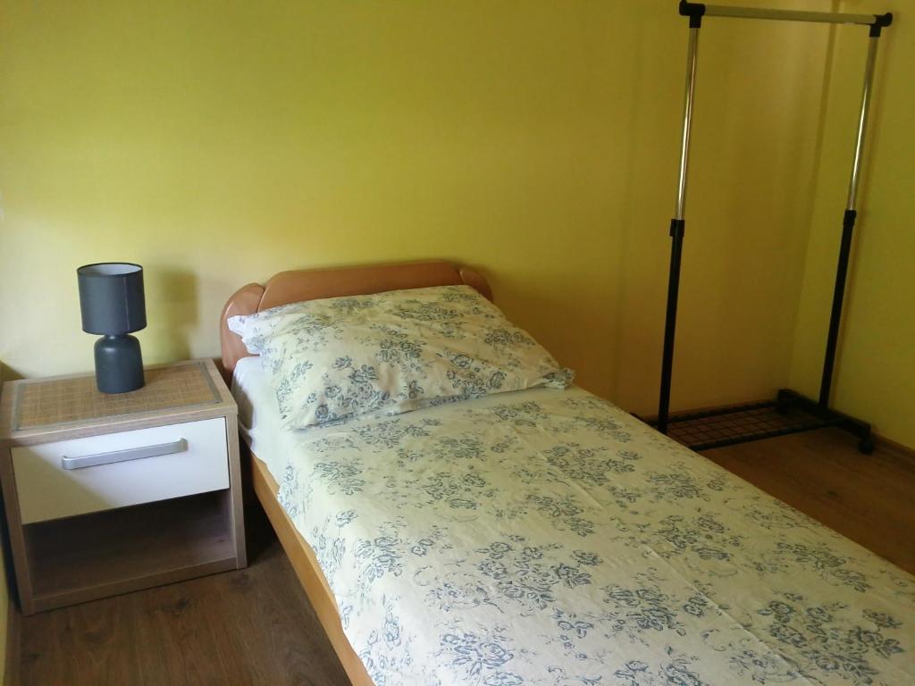 Postel nebo postele na pokoji v ubytování Apartments Uno