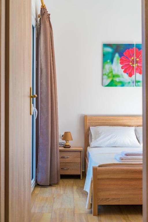 Posteľ alebo postele v izbe v ubytovaní Abeli Villas