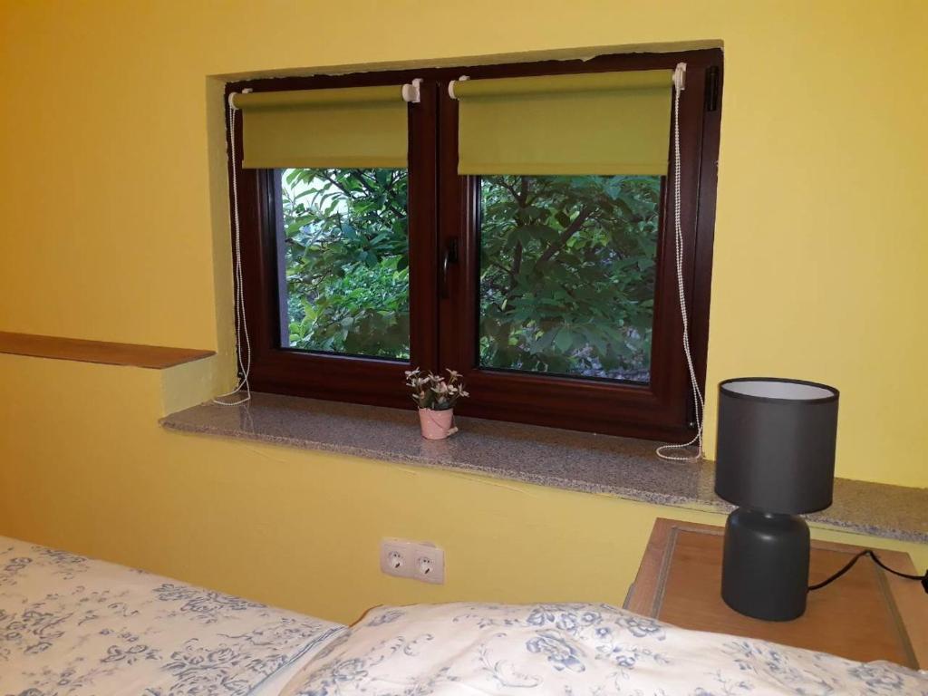 Postel nebo postele na pokoji v ubytování Apartments Uno