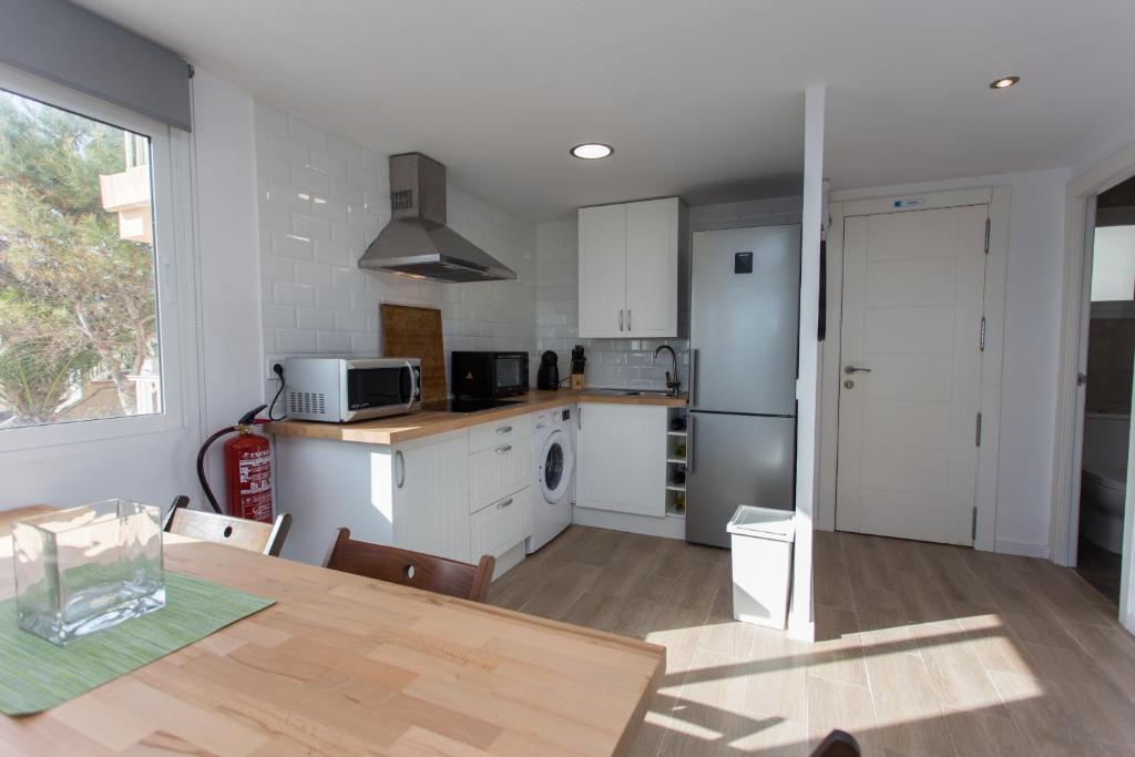 Kuchyň nebo kuchyňský kout v ubytování Lighthouse Cullera Penthouse