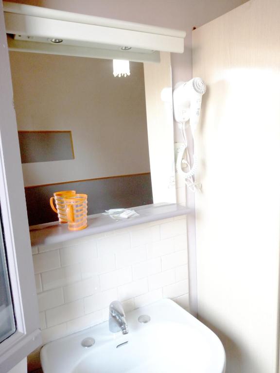 Koupelna v ubytování Hotel Lorena