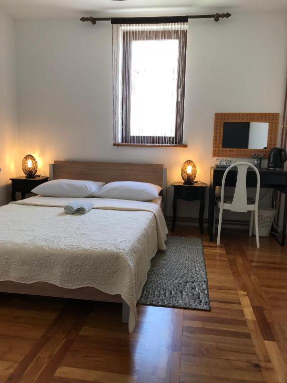 Posteľ alebo postele v izbe v ubytovaní Guest House Aurora